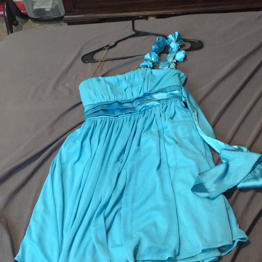 Short blue dress with flower strap